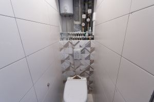 Облицовка стен в туалете, керамическая плитка