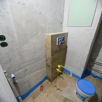 Укладка керамогранита в ванной комнате, облицовка инсталляции