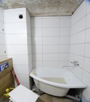 Облицовка стен ванной комнаты керамической плиткой