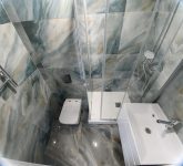 Выполненный ремонт в санузле 180x150 с перепланировкой, замена ванны на душевой угол