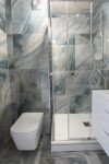 Выполненный ремонт в санузле 180x150 с перепланировкой, устройство душевого угла 80x100